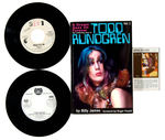 “TODD RUNDGREN” EXTENSIVE LOT INCLUDING SIGNED BOOK AND PROMOTIONAL SINGLES.