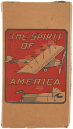 SPIRIT OF ST. LOUIS-INSPIRED BOXED TIN AIRPLANE RADIATOR ORNAMENT WITH AMERICAN FLAGS.