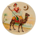 EGYPTIAN-THEMED SHRINE FRATERNAL BUTTON FROM 1898 SHOWS LADY POSING ATOP A CAMEL.