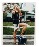 TRACI LORDS SIGNED PHOTO & MOVIE STANDEE PAIR.