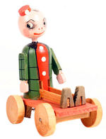 HAPPY HOOLIGAN-INSPIRED MECHANICAL WOODEN PULL TOY.