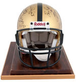 HEISMAN TROPHY WINNERS MULTI-SIGNED LIMITED EDITION FOOTBALL HELMET DISPLAY.