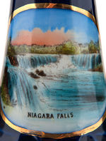 “NIAGARA FALLS” COBALT BLUE SEVEN PIECE SOUVENIR CHINA COLLECTION.