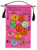 "AUTHENTIC 'PEANUTS' BUTTONS" RARE FELT BANNER FROM 1966 PLUS TEN BUTTONS.