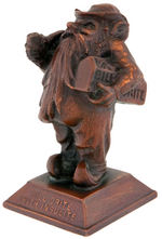 “BILL DRITE WITH INSULITE” BRONZE GNOME PAPERWEIGHT.