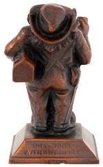 “BILL DRITE WITH INSULITE” BRONZE GNOME PAPERWEIGHT.