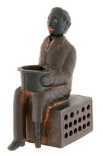 PEG-LEG BEGGAR CAST IRON MECHANICAL BANK - BLACK FACE VARIETY.