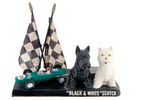 “BLACK & WHITE SCOTCH” FIGURAL DISPLAY WITH INDY 500 TIE-IN.