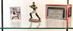 GARTLAN DEALER'S DISPLAY SHOWCASE WITH LOT OF TEN SPORTS COLLECTIBLES.