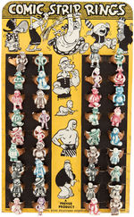 “COMIC STRIP RINGS” COMPLETE SET OF 36 ON STORE DISPLAY CARD.