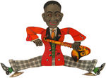 BLACK AMERICANA SAXOPHONE PLAYER SQUEEZE TOY.