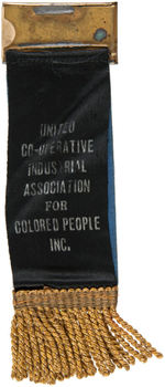 SCARCE "UNITED CO-OPERATIVE INDUSTRIAL ASSOCIATION FOR COLORED PEOPLE INC" RIBBON BADGE.