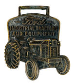 "FORD INDUSTRIAL TRACTORS AND EQUIPMENT" SILVERED BRASS WATCH FOB.