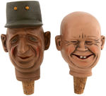 FIVE LARGE BOTTLE STOPPERS INCLUDING CHURCHILL JOHNSON AND TWO SIDED KHRUSHCHEV.