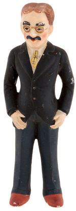 "GROUCHO MARX" BISQUE FIGURE.