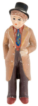 "HARPO MARX" BISQUE FIGURE.