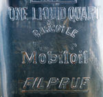 "GARGOYLE MOBILOIL FILPRUF” SPECIALLY DESIGNED BOTTLE AND SPOUT.