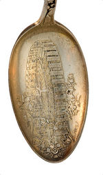 OUTSTANDING COLUMBIAN EXPOSITION 1893 SPOON WITH 16 PALMER COX BROWNIES AROUND FERRIS WHEEL.