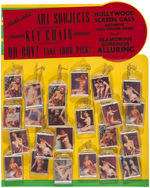 "HOLLYWOOD SCREEN GALS" NUDE PHOTO PIN-UP KEYCHAINS DISPLAY.