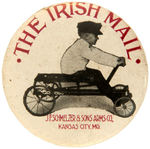 “THE IRISH MAIL” BUTTON SHOWING YOUNG BOY ON HIS TOY VEHICLE.