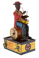 "SPIC COON DRUMMER" BLACK AMERICANA WIND-UP TOY.