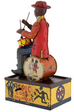 "SPIC COON DRUMMER" BLACK AMERICANA WIND-UP TOY.