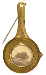 “SOUVENIR PAN-AMERICAN EXPOSITION” LARGE EMBOSSED BRASS FIGURAL STICKPIN WITH CELLO INSERT.