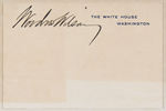 WILSON SIGNED WHITE HOUSE CARD MOUNTED WITH LOOSE ENVELOPE & EXTRAS.
