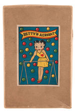 BETTY BOOP "BETTY'S ACROBAT" BOXED CELLULOID WIND-UP TRAPEZE TOY.