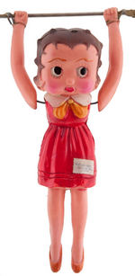 BETTY BOOP "BETTY'S ACROBAT" BOXED CELLULOID WIND-UP TRAPEZE TOY.