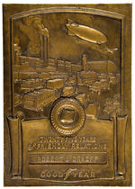 “GOODYEAR TWENTY-FIVE YEARS OF FRIENDLY RELATIONS” CAST IRON AWARD PLAQUE.