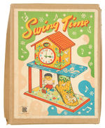 “SWING TIME” BOXED VARIETY WINDUP CLOCK WITH GIRL.