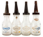 “SUNOCO” LOT OF SEVEN OIL BOTTLES WITH CARRIER.