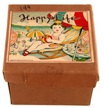 "HAPPY LIFE" BOXED CELLULOID & TIN WIND-UP.