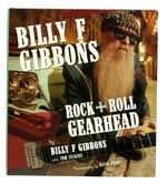 NEIL YOUNG & ZZ TOP'S BILLY GIBBONS SIGNED BOOK PAIR.