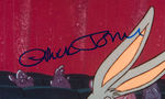 CHUCK JONES SIGNED PHOTO PAIR.