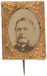 CHESTER A. ARTHUR CARDBOARD PHOTO IN BRASS SHELL STICKPIN.