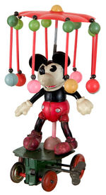 MICKEY MOUSE CELLULOID WINDUP CAROUSEL TOY.