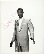 NAT KING COLE SIGNED PUBLICITY PHOTO.