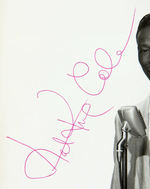 NAT KING COLE SIGNED PUBLICITY PHOTO.