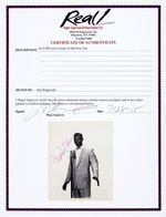 NAT KING COLE SIGNED PUBLICITY PHOTO.