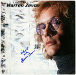 WARREN ZEVON SIGNED "A QUIET NORMAL LIFE: THE BEST OF WARREN ZEVON" LP ALBUM COVER.