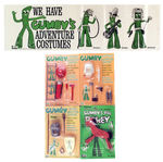 "GUMBY'S ADVENTURE COSTUMES" SIGN AND PACKAGED OUTFITS.