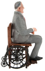 FDR ONE-OF-A-KIND RESIN FIGURE IN WOOD AND WIRE WHEELCHAIR.