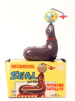 "LINE MAR" SEAL WITH REVOLVING SATELLITE" BOXED WIND-UP.