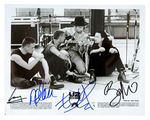 U2 SIGNED "RATTLE AND HUM" SIGNED PUBLICITY STILL.