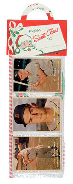 CHRISTMAS RACK PACK WITH 12 TOPPS 1957 BASEBALL CARDS.