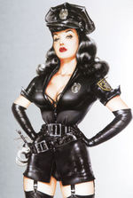 "BETTIE PAGE BY OLIVIA" LIMITED EDITION BOOK DOUBLE-SIGNED BY PIN-UP QUEEN BETTIE PAGE & OLIVIA.