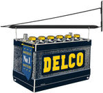 "DELCO" AUTOMOBILE BATTERIES ADVERTISING SIGN WITH BRACKET.