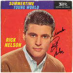 RICK NELSON SIGNED "SUMMERTIME/YOUNG WORLD" 45 RECORD SLEEVE.
